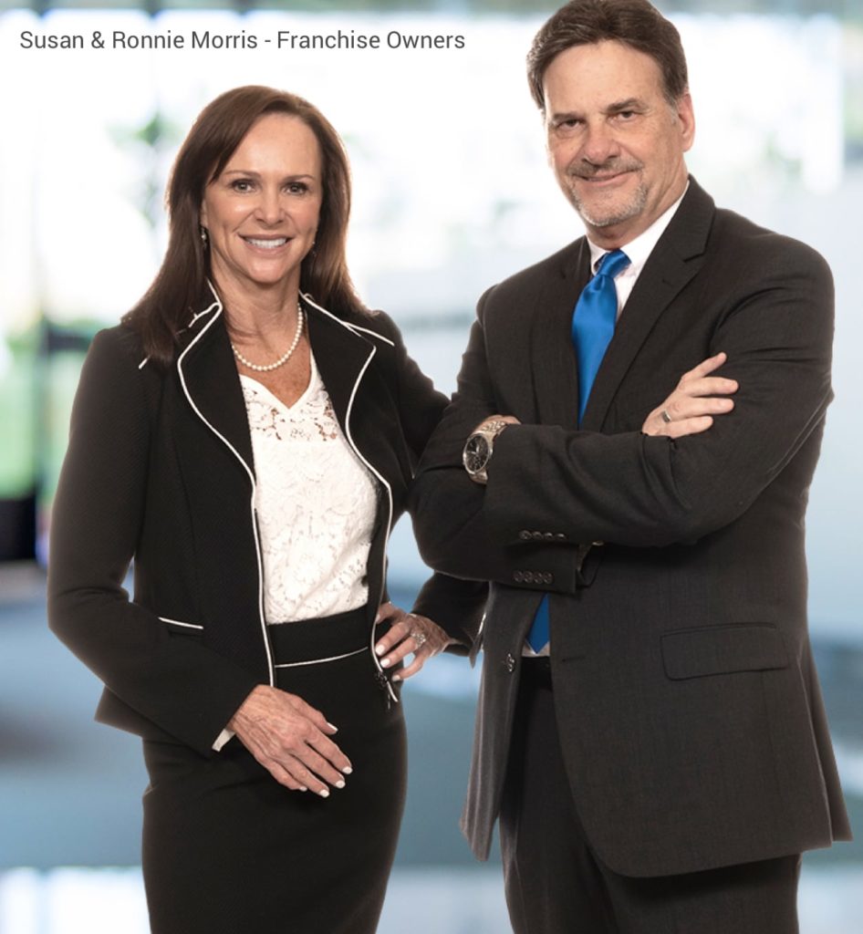 Image of franchise owners Susan and Ronnie Morris in professional attire