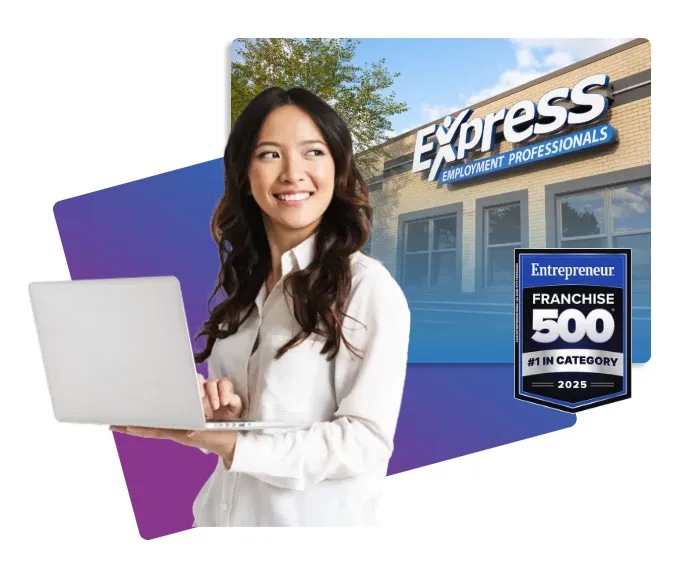 Woman on laptop in front of Express building